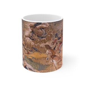 May include: A white ceramic mug with a colorful tapestry design depicting a scene from the Bible. The scene shows a man in the clouds with a halo, surrounded by other figures. The tapestry is in shades of brown, gold, red, and blue.