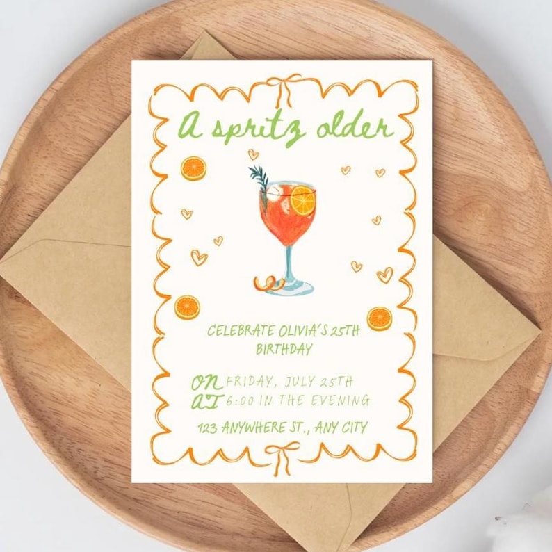An invitation over a brown envelope that reads “a spritz older. celebrate Olivia’s 25th birthday”. orange scribble style border. small orange slices and hearts throughout design. an image of an aperol spritz