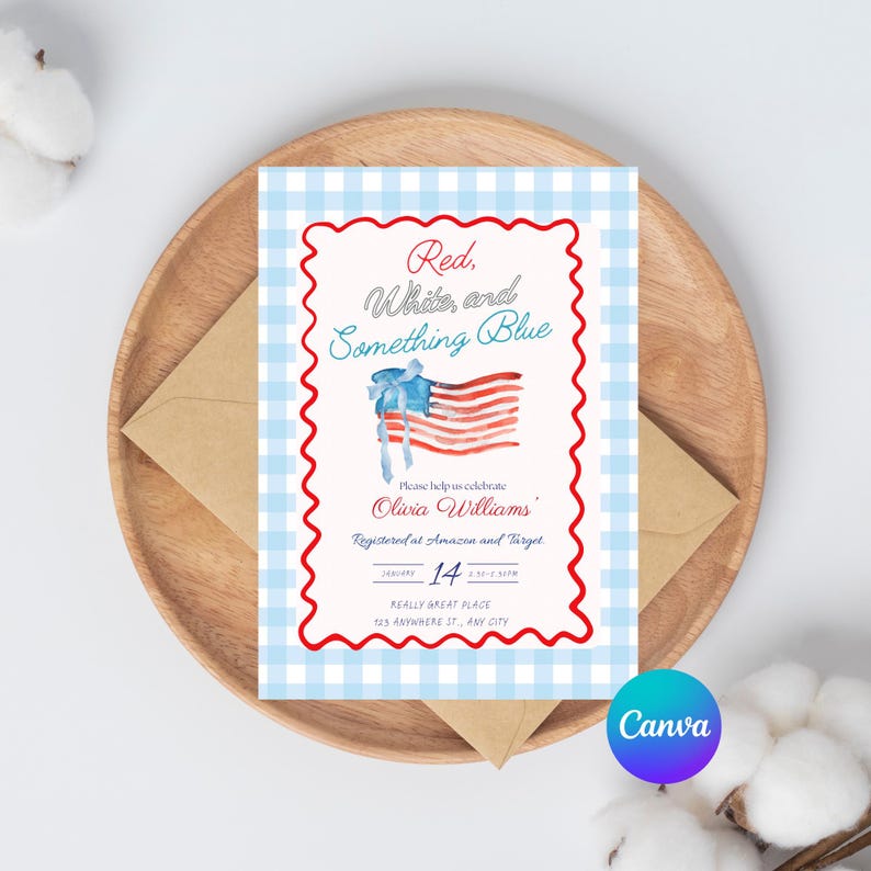 A bridal shower invitation card with a blue gingham border, placed on a round wooden tray with a kraft envelope underneath. The card features a red, white, and blue watercolor American flag with a blue bow and reads: “Red, White, and Something Blue.” It invites guests to celebrate Olivia Williams, noting she is registered at Amazon and Target. The event is on January 14 from 2:30–5:30 PM at "Really Great Place, 123 Anywhere St., Any City." The Canva logo is visible in the bottom right corner.