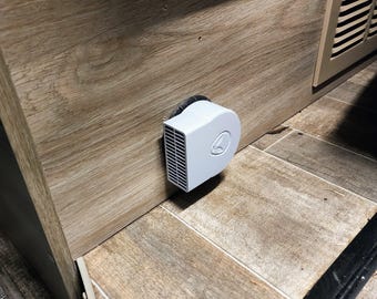 Rotating 90 degree deflector for the Truma Combi air vents in a Winnebago Travato