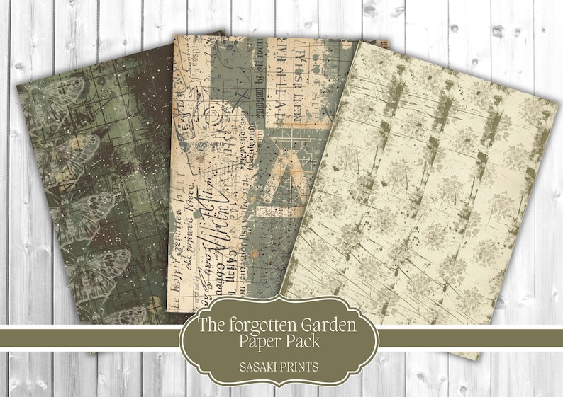 May include: A paper pack with three sheets of decorative paper. The sheets have a vintage aesthetic with botanical and text-based designs in shades of green, brown, and cream. The text "The forgotten Garden Paper Pack" is visible.
