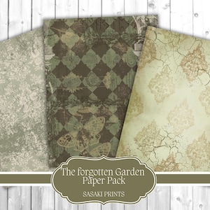 May include: Three sheets of decorative paper with vintage designs. The papers feature floral, diamond, and cracked patterns in muted green, brown, and beige tones. The text "The forgotten Garden Paper Pack" and "SASAKI PRINTS" are visible.
