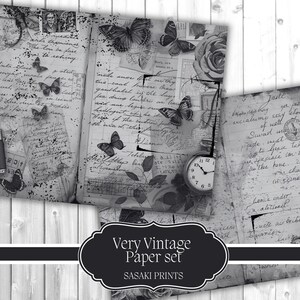 May include: A grayscale image of a vintage paper set with butterflies, roses, and handwritten script. A camera and pocket watch are also visible. The text "Very Vintage Paper set" is displayed on a black label.
