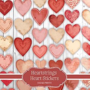 Puede incluir: Una colección de pegatinas en forma de corazón en varios tonos de rojo, rosa y crema, con texturas desgastadas y patrones decorativos. Las pegatinas están dispuestas sobre un fondo de madera blanca. Incluye el texto "Heartstrings Heart Stickers".