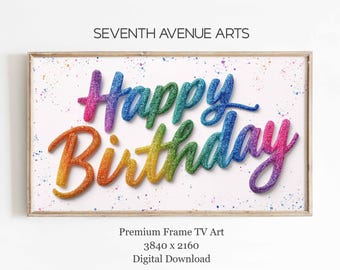May include: A framed digital art print with the words "Happy Birthday" in colorful glitter lettering. The text is in a cursive font and is set against a white background with colorful paint splatters. The frame is a light wood color.