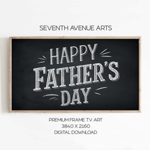 May include: A black chalkboard with a white inscription that reads "HAPPY FATHER'S DAY" in a stylized font. The chalkboard is framed in wood.