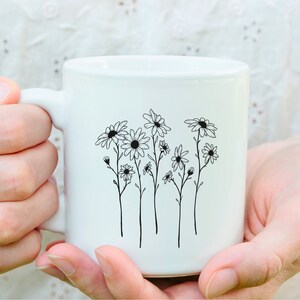 Daisy SVG | Daisy Svg Bundle | Wildflower Svg | Botanical svg | Daisy Flower Clipart | Floral Svg | Daisy Clipart | Birth Month Svg | Daisy SVG bundle comes with 15 hand-drawn designs. You can use them with Cricut, Silhouette, and other cutting machines. Perfect for mugs, tumblers, t-shirts, stickers, wall art, vinyl projects, cards, scrapbooking, tote bags. Available in SVG, PNG, EPS, and DXF formats. Can also be used as daisy clipart, invitation cards, greeting cards, posters, scrapbooks.