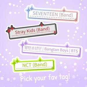 May include: A purple background with white stars and four colorful rectangular tags with the names of K-pop bands: SEVENTEEN (Band), Stray Kids (Band), 방탄소년단 | Bangtan Boys | BTS, and NCT (Band). The text "Pick your fav tag!" is at the bottom of the image.