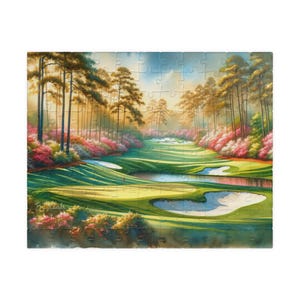 May include: A jigsaw puzzle depicting a watercolour painting of a golf course. The image shows a green fairway, water hazards, and sand traps. Trees and colourful flowers line the course. The sky is a mix of blue and yellow. The puzzle is made of many interlocking pieces.
