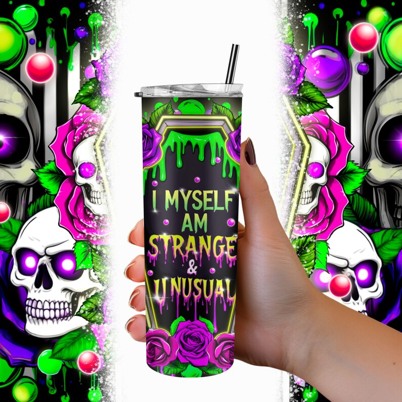 May include: A black and green stainless steel tumbler with a skull and rose design. The tumbler has the text "I Myself Am Strange & Unusual" printed on it.