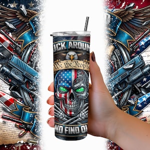 May include: A stainless steel tumbler with a black straw, featuring a patriotic skull design. The skull is split, with the American flag on one side and a metallic design on the other. The tumbler has the text "F*ck Around and Find Out" and "We the People".