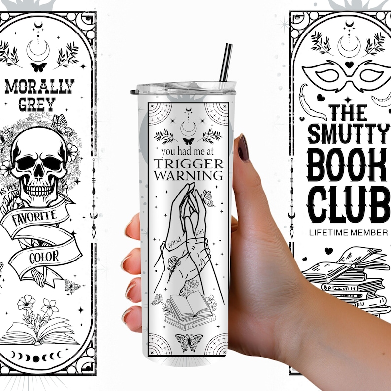 May include: A black and white tumbler with the text "you had me at trigger warning" and a graphic of two hands holding a book. The tumbler is surrounded by a black and white border with stars and butterflies.