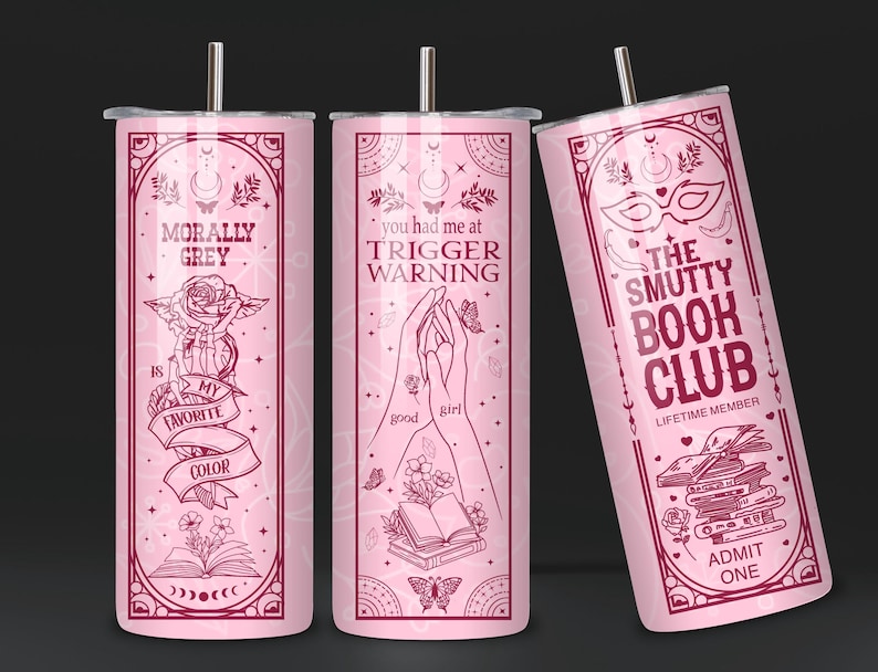 May include: Three pink stainless steel tumblers with different designs. The first tumbler has the text "Morally Grey is my favorite color" with a rose and a book. The second tumbler has the text "You had me at Trigger Warning" with a hand and a book. The third tumbler has the text "The Smutty Book Club Lifetime Member" with a mask, a book stack, and the text "Admit One".