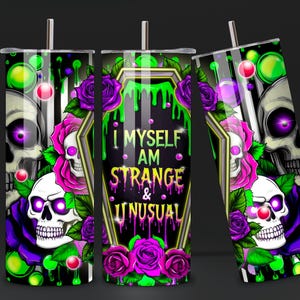 May include: A black and green tumbler with a skull and floral design. The tumbler has the text "I Myself Am Strange & Unusual" on the front.