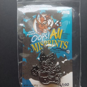 Retired 1.5″ Stamped Metal Fursona Pin – Oops All Misprints • Limited Furry Fandom Badge • Sealed & Numbered