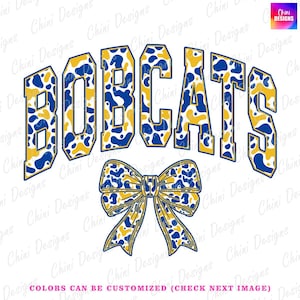May include: A graphic design featuring the word "BOBCATS" in a bold, arched font. The letters are filled with a blue and yellow spotted pattern, with a matching bow at the bottom. The text "COLORS CAN BE CUSTOMIZED" is at the bottom.
