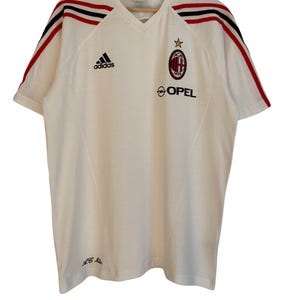 Camiseta Adidas Vintage A.C. Milan Talla L (D5) blanca con rayas rojas y negras, escudo Y2K de los años 2000 bordado, Opel Training 2005