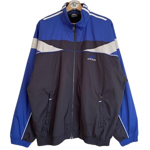 Chaqueta deportiva vintage Adidas talla L (D6) La mejor chaqueta clásica de los 2000, estilo Y2K, negra, azul, blanca, con cremallera completa y logo bordado 2003