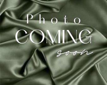 May include: Olive green satin fabric with the words "Photo COMING soon" in white script. The fabric is draped and has soft folds, creating a luxurious texture. The image is likely for an e-commerce product listing.