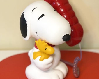 Gloednieuwe Snoopy telefoon en bank in originele doos