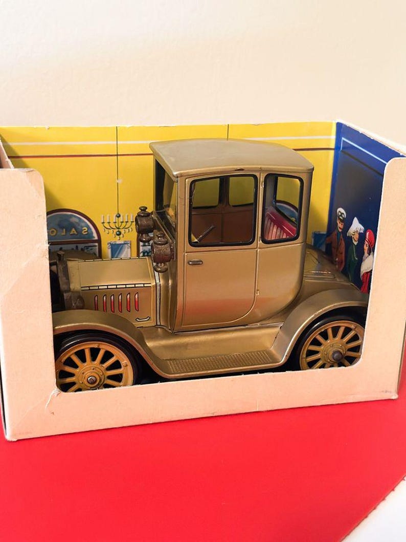 SCHUCO. Modèle réduit musical Ford coupé T 1917. Marqué 4014 - Lot 250