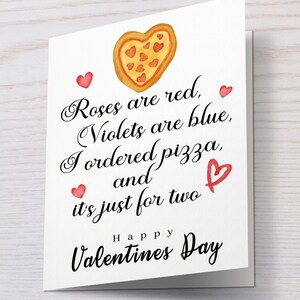 May include: A Valentine's Day card with a watercolor pizza slice in the shape of a heart. The card reads "Roses are red, Violets are blue, I ordered pizza, and it's just for two. Happy Valentines Day."
