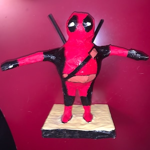 handmade papier mache figurine superhero