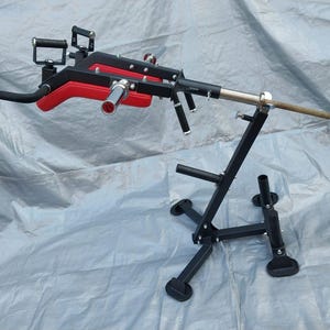 Squat attachment for any Barbell. With Stand. Do Calf Press, Shoulder press, Deadlifts with rotating grips for unlimited variations.