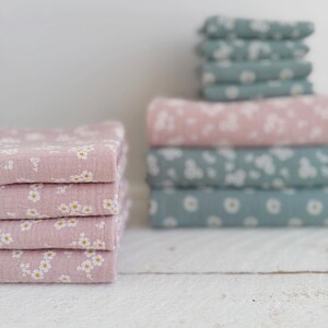 Double gauze muslin cotton fabric with design with flowers for baby toddlers dress table napkins rompers per meter cut 10 meters sewing eco friendly for summer breathable mix and match made to order pillow covers blankets weddings Christmas Easter table runners handmade products gift idea soft cotton breathable lightweight organic clothing gauze natural neutral colors with design print double layered baby wrap for photo shoot photoshoot textured for crafts bibs gauze sheets swaddles casual soft