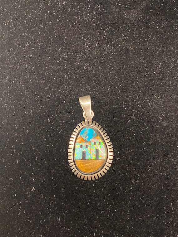 Native American style silver inlay pendant