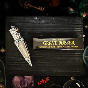 Grave Robber Lip Gloss | ginger peach | iridescent gold | shimmer | witchy makeup | witchy lip gloss | goth makeup | vegan and cruelty-free