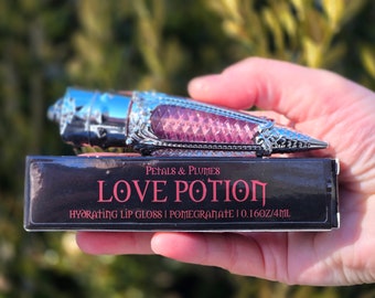 Love Potion Lip Gloss | pomegranate | rose gold | witchy makeup | witchy lip gloss | goth makeup | vegan and cruelty-free