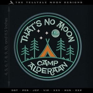 May include: An embroidered patch in green and white with the text "That's No Moon" and "Camp Alderaan". The patch features a stylised image of a tent, trees, and a Death Star.