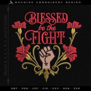 May include: Machine embroidery design on black fabric. The design features the text "BLESSED be the FIGHT" in red, with a raised fist and floral accents. The design is approximately 4 to 10 inches in height.