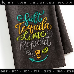 May include: Black kitchen towel with embroidered text "Salt Tequila Lime Repeat" in green, yellow, and blue. The text is surrounded by a small illustration of a salt shaker, a shot glass, and a lime wedge.