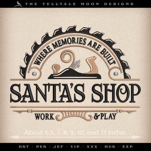 May include: Embroidered design featuring a saw blade, a hand plane, and the text "WHERE MEMORIES ARE BUILT" and "SANTA'S SHOP". The design also includes the text "WORK & PLAY". The design is approximately 6.5, 7, 8, 9, 10, and 12 inches in size.