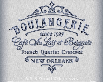 May include: Blue embroidered logo for a bakery called "Boulangerie" with the text "since 1927", "Café Au Lait et Beignets", "French Quarter Crescent", "NEW ORLEANS", and "6, 7, 8, 9, and 10 Inch Sizes".