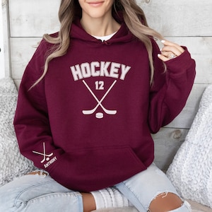CUSTOM Hockey Sweatshirt Personalized with Hockey Player&#39;s Number on Front and Name on Sleeve, Hoodie Sweatshirt,  Hockey Lover, Hockey Mom