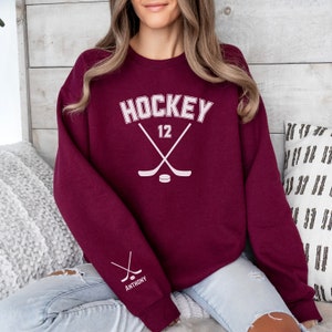 CUSTOM Hockey Sweatshirt Personalized with Hockey Player&#39;s Number on Front & Name on Sleeve, Crewneck Sweatshirt,  Hockey Lover, Hockey Mom