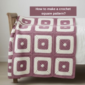 May include: A crochet blanket made of alternating mauve and cream-colored square motifs. The blanket features a repeating pattern of concentric squares. Text on the image reads: How to make a crochet square pattern? The blanket is draped over a bed.