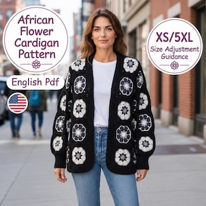 May include: A black crochet cardigan featuring an African flower pattern with white and grey floral motifs. The garment includes text overlays: African Flower Cardigan Pattern, English PDF, and XS/5XL Size Adjustment Guidance with a US flag icon.
