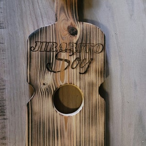 Puerto Rican style guitar shaped bottle opener