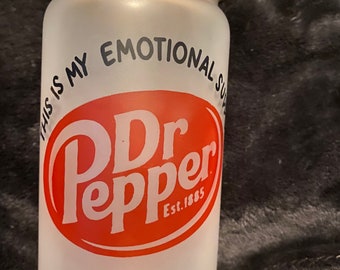 May include: A frosted glass jar with a bamboo lid. The jar has a red and white Dr Pepper logo with the text "This is my emotional support" and "Est. 1885" printed on it.