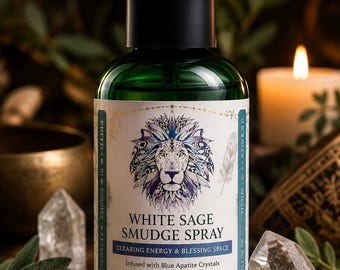 May include: A green glass spray bottle with a black pump top and a white label. The label features a lion illustration, gold accents, and text reading White Sage Smudge Spray, Clearing Energy & Blessing Space, Infused with Blue Apatite Crystals, 4 FL OZ (118 ML).