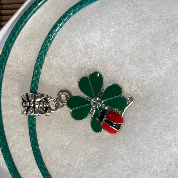 Bargain Shamrock Charm on green thin woven braid strand