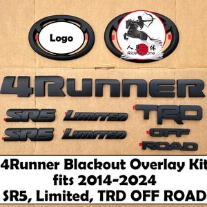 May include: A black 4Runner Blackout Overlay Kit featuring emblems such as "4RUNNER", "SRS", "Limited", "TRD", and "OFF ROAD". Designed for 2014-2024 models. Includes two oval emblems, one with "Logo" and the other with a graphic.