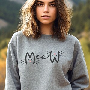 Meow sweater discount