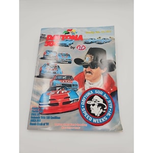 May include: A Daytona 500 by STP magazine cover featuring race cars and a portrait of a driver. The cover includes the text "Daytona 500" and "Speed Weeks '91". The magazine is from Sunday, Feb. 17, 1991.