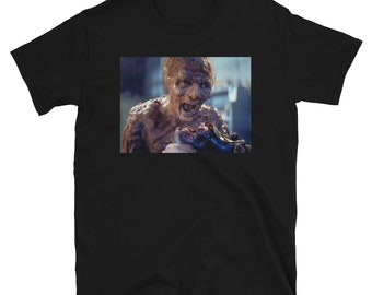 the fly jeff goldblum behind the scenes puking in a shoe t-shirt