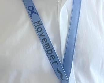 MOVEMBER  Tour de cou pour badge, clés, carte cantine, carte de bus.... 1euro versé par achat à la ligue